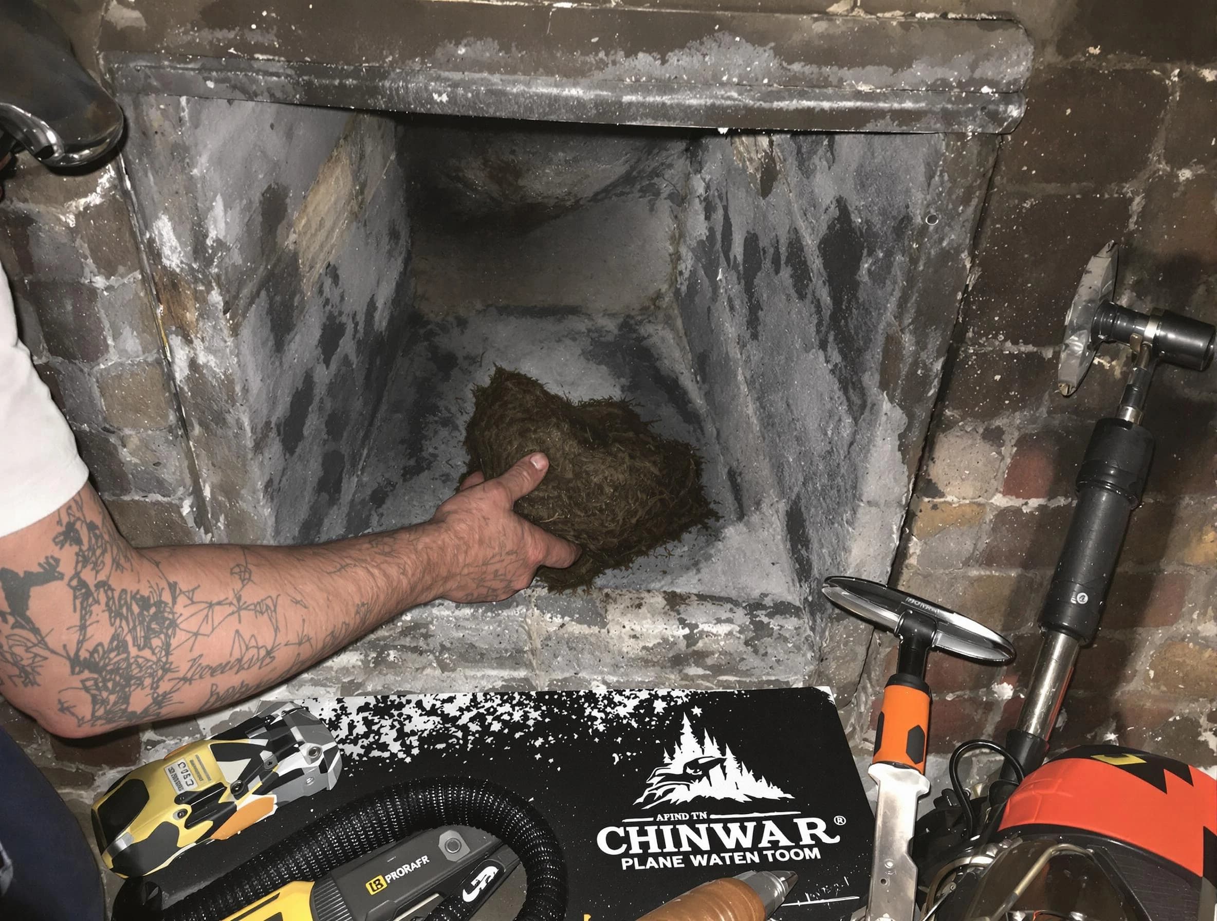 Cedar Hills Chimney Sweep safely removing debris and screening chimney in Cedar Hills, UT
